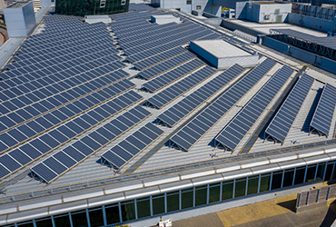 building with a lot of solar panels on the roof